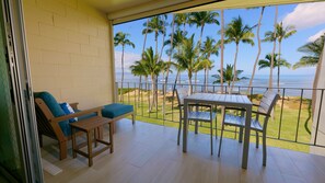 Enlarged lanai with motorized sun shade.