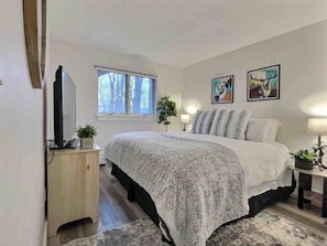 Unwind in our king bed with plush linens for a dreamy sleep.