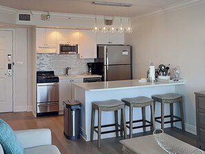 Fully Equipped Kitchen + Breakfast Bar