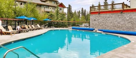 Premium 2BR condo, walk distance to downtown Canmore. Heated Pool, Three Hot Tubs, Fitness room and more.  