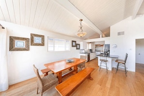 The kitchen opens to the bar seating and dining area, so that no chef is left out of the fun!
                
