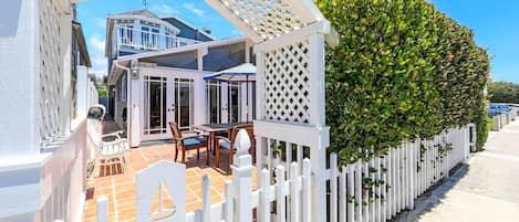 The adorable entry to this 6 bedroom home, just two houses from the sand!