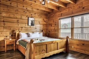 The Main floor Master Bedroom features a King Size bed and an in-suite bathroom.
