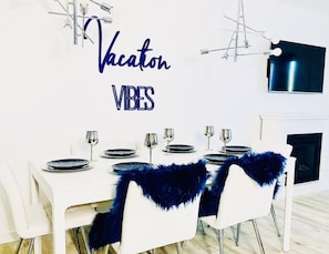 Full size dining table for 6. Large enough to be a dedicated workspace.