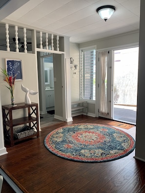 Inviting entrance with large storage closet.