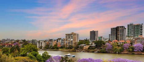 Enjoy a sunset over the Brisbane River on your spacious penthouse balcony.