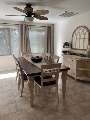 Another view of the dining room area with plenty of room to seat 8 comfortably.