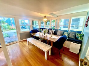 Formal dining area with lake views! Seats up to 10!