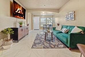 Bright, airy & modern - the living room is a wonderful gathering spot 