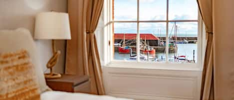 Stunning views of the peaceful harbour from 1 of 2 king bedrooms.