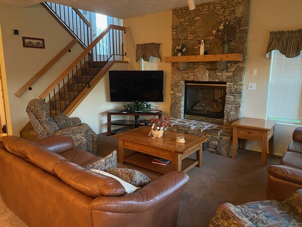 Enjoy the gas fireplace and family time in our living room