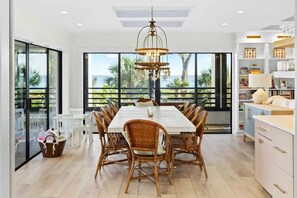 Seating for up to 10 at the large dining table overlooking the Gulf of Mexico