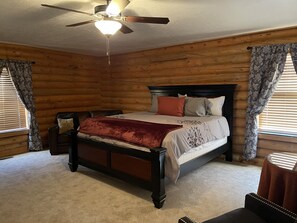 The master bedroom with a king bed.