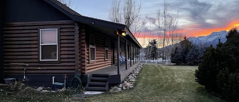 Beautiful sunset in the Heber Valley area with a great  log cabin type home.