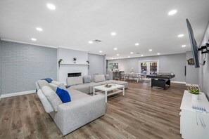 Feel refreshed in our beautiful and cozy living area with a lovely modern couch! Get your everyone to enjoy playing competitive games or watch great movies together! Send us a message now!