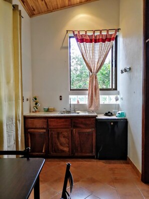 Kitchenette and indoor dining area.