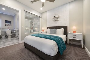 Luxurious bedroom with a queen bed.
