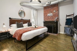 Second bedroom with queen bed, perfect for guests.