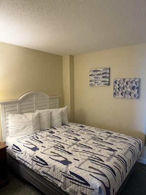 (2) Queen beds with TV in bedroom