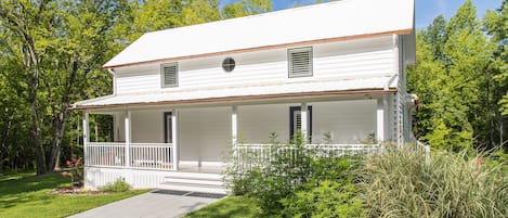Enjoy historical significance in this fully remodeled, authentic farm house.