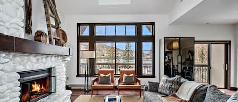 Living Room with lots of natural light (remote shades on windows) 