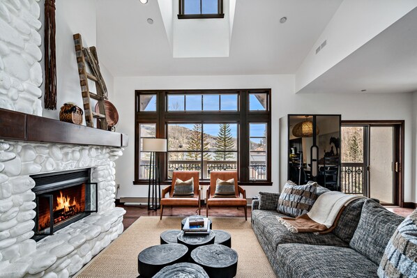 Living Room with lots of natural light (remote shades on windows) 