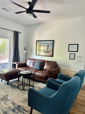 LR with views of the cove side of property and comfortable furniture 