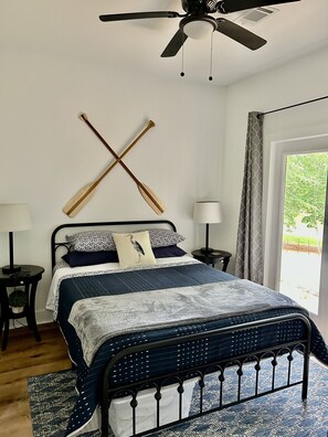 Primary bedroom with access to the back patio 