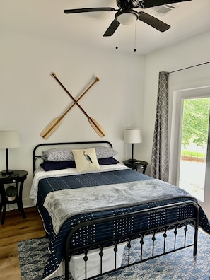 Primary bedroom with access to the back patio