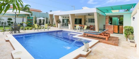 Pool and exterior areas of Villa Alida. Also on the right you can see the 2nd kitchen and Bar. Pool includes a small jacuzzi on the right.