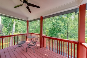 Back porch by the river with dinette set