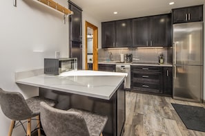 Cook a delicious meal in this beautiful kitchen | Main Level