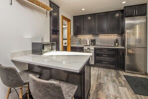 Cook a delicious meal in this beautiful kitchen | Main Level