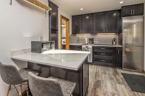 Cook a delicious meal in this beautiful kitchen | Main Level