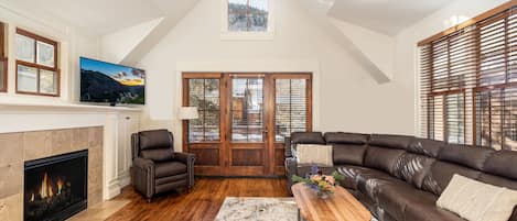 The great room is a wonderful gathering place. Vaulted ceilings and a southern exposure deck! A perfect location - less than a half block from the Gondola and less than a half block from Main Street!.