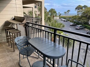 Seating on your private balcony with ocean views!