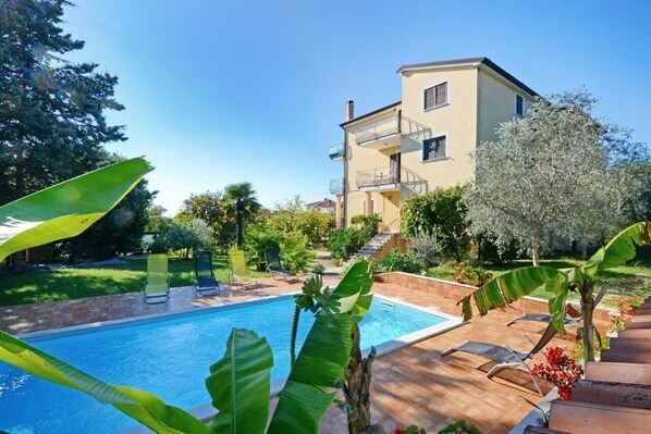 The family house with beautiful outdoor swimming pool and sun loungers available