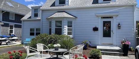 Front patio added in 2022 to optimize late day sun & neighborhood gatherings. 