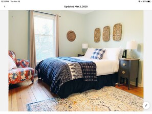 Queen bedroom with private bath and sleeping porch. 