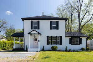 Front of house.  Unit B is upstairs and entrance is the pink door on the left side of the house.