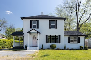 Front of house. Unit B is upstairs and entrance is the pink door on the left side of the house.