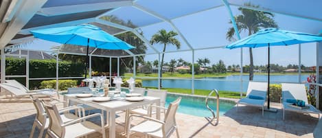 Ready to relax??  Lanai with private salt water pool and lake view