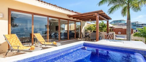 Balcony just outside the Living / Dining rooms with plenty of space to get some sun, cool off in the plunge pool and enjoy a meal under the pergola.