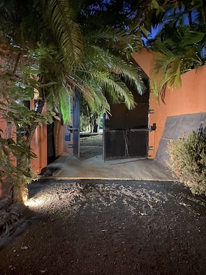 Entrance to enclosed private villa parking for 3 cars