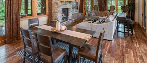 Living room opens to a covered deck with amazing outdoor furniture.