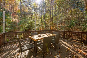 Back deck with wonderful privacy and beautiful string lights