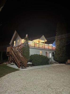 Full lighting on your deck provides a warm welcome at night.