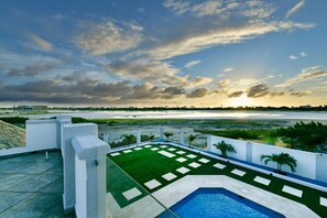 Ritardando rooftop terrace of the Apartment in Noord Aruba - Stunning ocean views - Breathe fresh air with our thoughtfully placed green companions - Amazing sunset views