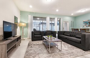Cozy & spacious living room with a Smart TV