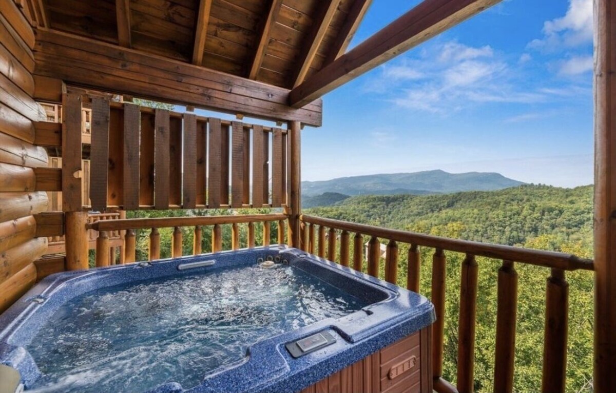 Private hot tub on the balcony of a mountain cabin overlooking the Smoky Mountains in TN. Top things to do in the smoky mountains